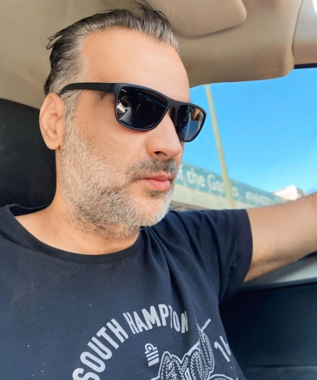 Μάνος (Οδηγός ταξί)