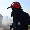 Πυροσβέστες σε πύρινο μέτωπο
