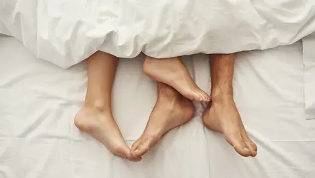 Ζευγάρι στο κρεβάτι