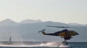 Έκανε ιστιοσανίδα δίπλα από πυροσβεστικό ελικόπτερο